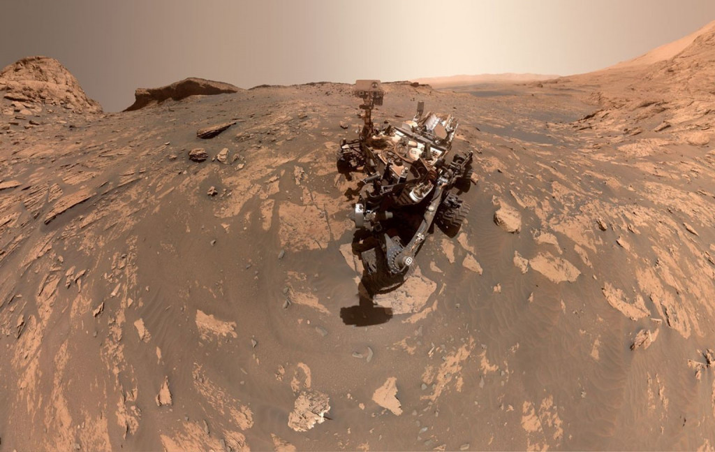 Curiosity Mars rover in the Martian landscape